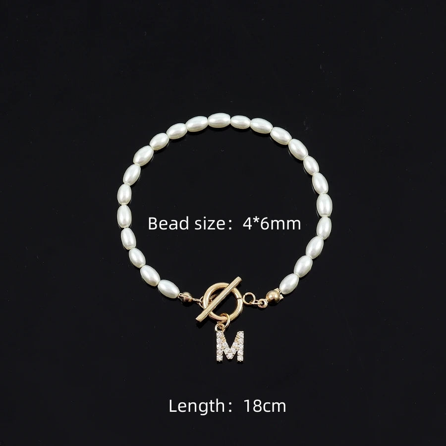 PAVE ZICRON 26 INITIAL BRACELET
