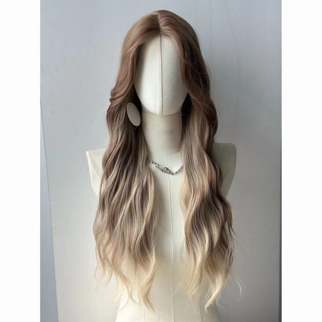 A full-length wig for women with long curly hair on the forehead